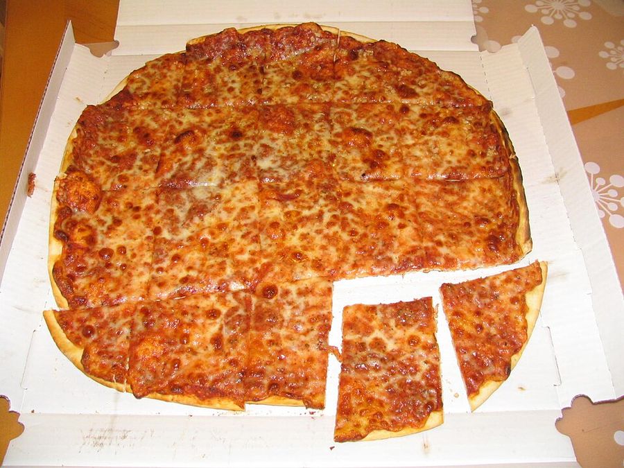 Thin tavern-style bar pizza cut in squares